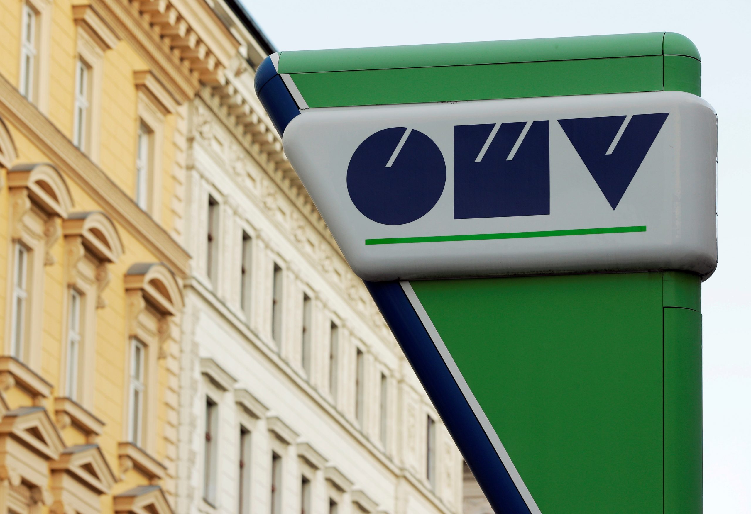 FILE PHOTO: Logo of Austrian oil and gas group OMV is seen at a gas station in Vienna FILE PHOTO: The logo of Austrian oil and gas group OMV is seen at a gas station in Vienna, Austria, October 30, 2018. Picture taken October 30, 2018. REUTERS/Heinz-Peter Bader/File Photo HEINZ-PETER BADER