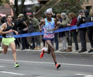 Abdihakem Abdirahman moves along Lafayette Avenue in the Brooklyn borough of New York during the New York City Marathon on Sunday, Nov. 5, 2017. (AP Photo/Julia Weeks)