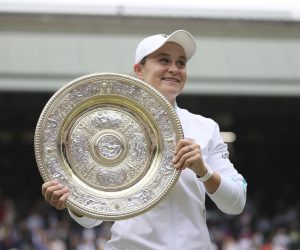 Ashleigh Barty of Australia holds victory trophy after winning the ladies' singles final of the Championships, Wimbledon against Karolina Pliskova of Czech Republic at the All England Lawn Tennis and Croquet Club in London, United Kingdom on July 10, 2021. ( The Yomiuri Shimbun via AP Images )