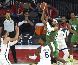 Nigeria's Gabe Nnamdi Vincent (22) looks to pass against the United States during an exhibition basketball game Saturday, July 10, 2021, in Las Vegas. (AP Photo/David Becker)