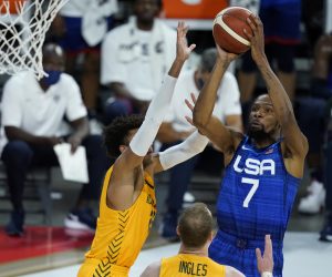United States' Kevin Durant shoots over Australia's Matisse Thybulle during an exhibition basketball game Monday, July 12, 2021, in Las Vegas. (AP Photo/John Locher)