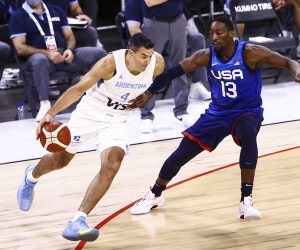 Argentina's Luis Scola (4) drives the ball against United States' Bam Adebayo (13) during the first half of an exhibition basketball game in Las Vegas on Tuesday, July 13, 2021. (Chase Stevens/Las Vegas Review-Journal via AP)