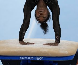 Simone Biles, of United States, trains on the vault for the artistic gymnastics at Ariake Gymnastics Centre venue ahead of the 2020 Summer Olympics, Thursday, July 22, 2021, in Tokyo, Japan. (AP Photo/Natacha Pisarenko)