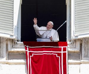 epa09304958 Pope Francis waves from the window of his office overlooking Saint Peter's Square as he leads the Angelus prayer, in Vatican City, 27 June 2021.  EPA/GIUSEPPE LAMI
