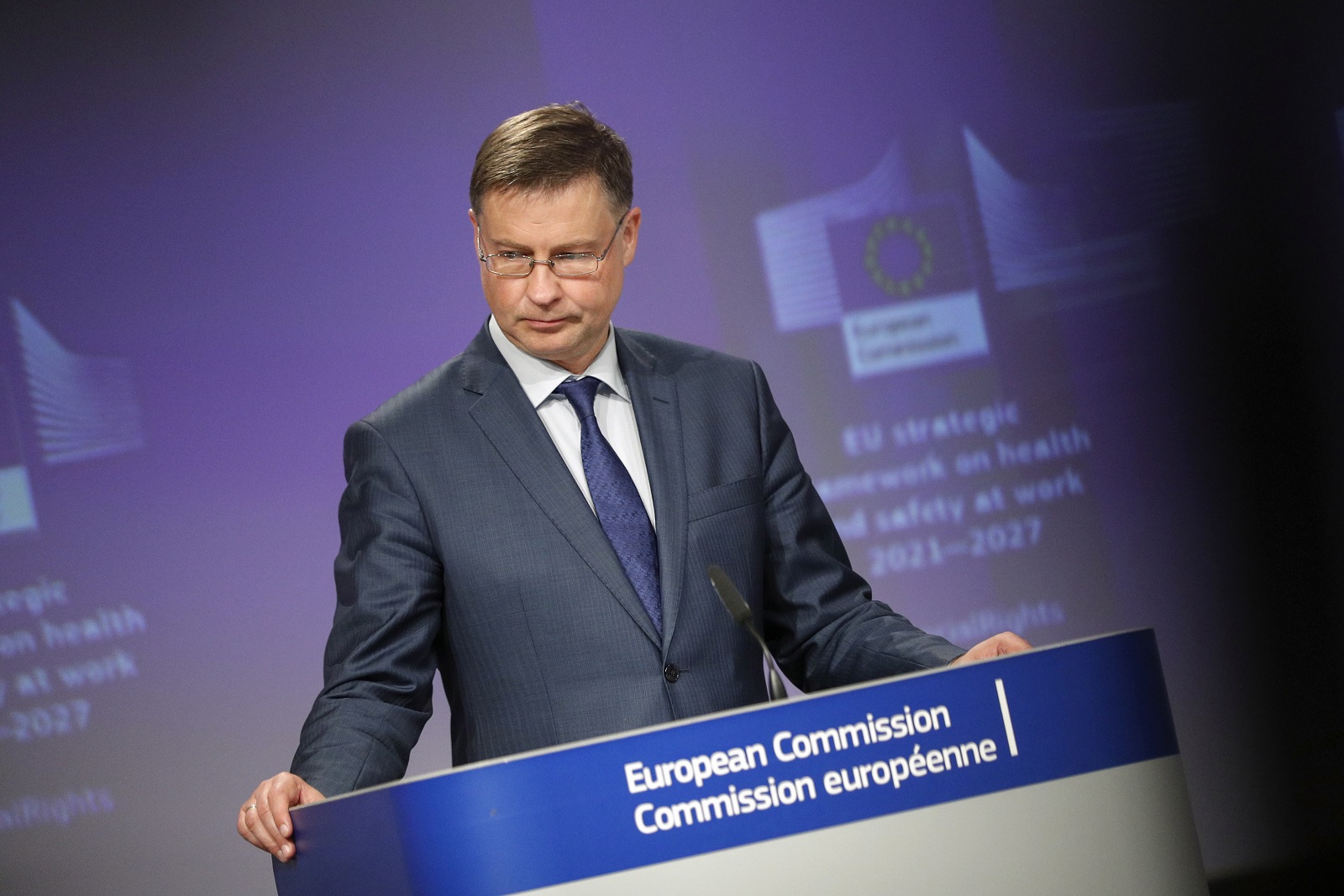 epa09307632 European Commission vice-president Valdis Dombrovskis gives a news conference with Commissioner Nicolas Schmit on communication on a new occupational safety and health strategy framework in Brussels, Belgium, 28 June 2021.  EPA/JOHANNA GERON / POOL
