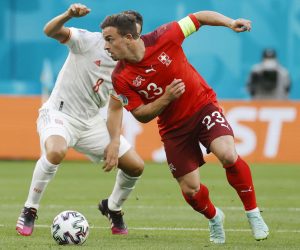 epa09318286 Xherdan Shaqiri of Switzerland in action agiant Spain's Koke (L) during the UEFA EURO 2020 quarter final match between Switzerland and Spain in St.Petersburg, Russia, 02 July 2021.  EPA/Anatoly Maltsev / POOL (RESTRICTIONS: For editorial news reporting purposes only. Images must appear as still images and must not emulate match action video footage. Photographs published in online publications shall have an interval of at least 20 seconds between the posting.)