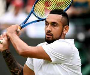 epa09320353 Nick Kyrgios of Australia hits a backhand during the 3rd round match against Felix Auger-Aliassime of Canada at the Wimbledon Championships, in Wimbledon, Britain, 03 July 2021.  EPA/NEIL HALL   EDITORIAL USE ONLY