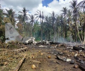 epa09321922 A handout photo made available by the Joint Task Force Jolo- Armed Forces of the Philippines (JTF-AFP) shows debris of a Philippine Air Force C-130 cargo plane at the vicinity of Jolo airport, Sulu island, Philippines, 04 July 2021. In a statement released by the office of Defense secretary Delfin Lorenzana, a C-130 aircraft of the Philippine Air Force crashed while landing at the Jolo airport on July 04,  with 92 soldiers on board including 3 pilots and 5 crew. As of the latest, 40 injured and wounded were rescued and 17 bodies recovered.  EPA/JTF HANDOUT  HANDOUT EDITORIAL USE ONLY/NO SALES
