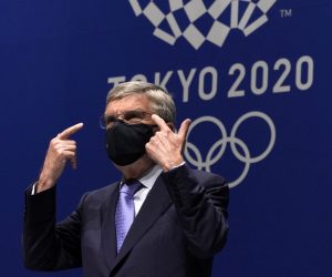 epa09349935 International Olympic Committee President Thomas Bach gestures during a press conference in Tokyo, Japan, 17 July 2021. Earlier in the day, the Tokyo Olympics organisers confirmed the first COVID-19 case in the Olympic Village less than a week before the opening of the Games.  EPA/FRANCK ROBICHON