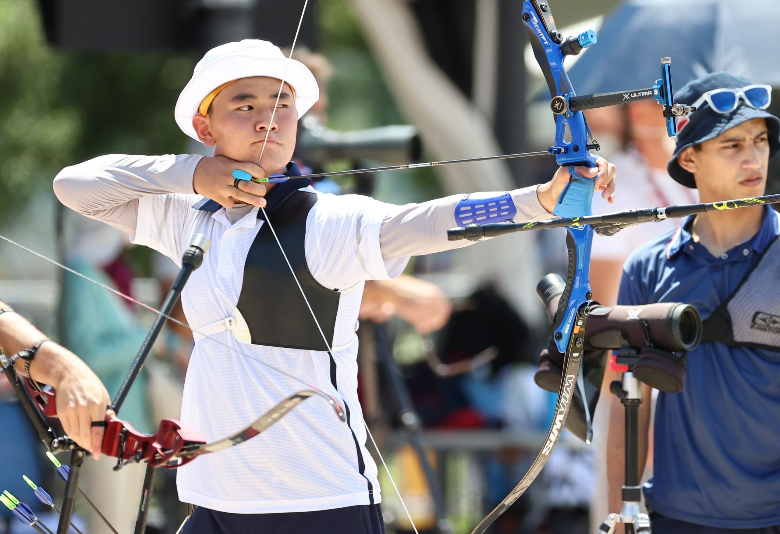 epa09359170 South Korean archer Kim Je-deok aims for the target in the men's individual ranking round at Yumenoshima Park Archery Field in Tokyo, Japan, 23 July 2021.  EPA/YONHAP SOUTH KOREA OUT