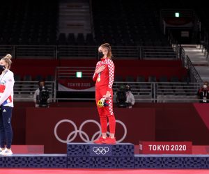 Tokio, 26.07.2021 - Hrvatska tekvondaica Matea Jelic (23) osvojila je naslov olimpijske pobjednice u kategoriji do 67 kilograma na Olimpijskim igrama u Tokiju, u finalu je uspjenija bila od Britanka Lauren Williams sa 25-21.
foto HINA/ Damir SENCAR/ ds