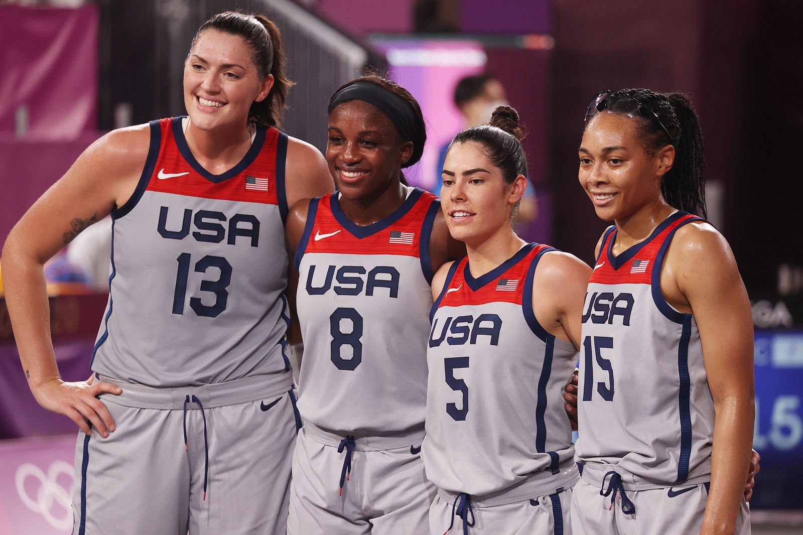 epa09374297 (L-R) Stefanie Dolson, Jackie Young, Kelsey Plum and Allisha Gray pose for a photograph after winning the Women's Gold Medal Game between the United States and Russia during the 3x3 Basketball events of the Tokyo 2020 Olympic Games at the Aomi Urban Sports Park in Tokyo, Japan, 28 July 2021.  EPA/FAZRY ISMAIL