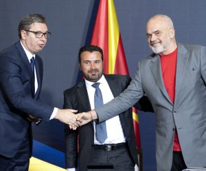 epa09376566 Serbian President Aleksandar Vucic (L), North Macedonia's Prime Minister Zoran Zaev (C) and Albanian Prime Minister Edi Rama (R) shake hands after signing documents during the Skopje Economic Forum on Regional Cooperation in Skopje, North Macedonia, 29 July 2021. The economic forum -- attended by Serbian President Vucic, Albanian Prime Minister Rama and North Macedonia's Prime Minister Zaev, who will present the political and economic vision of the integrated region --  is organized within the framework of the Four Freedoms Initiative, launched by the leaders of Albania, North Macedonia, and Serbia in October 2019.  EPA/GEORGI LICOVSKI
