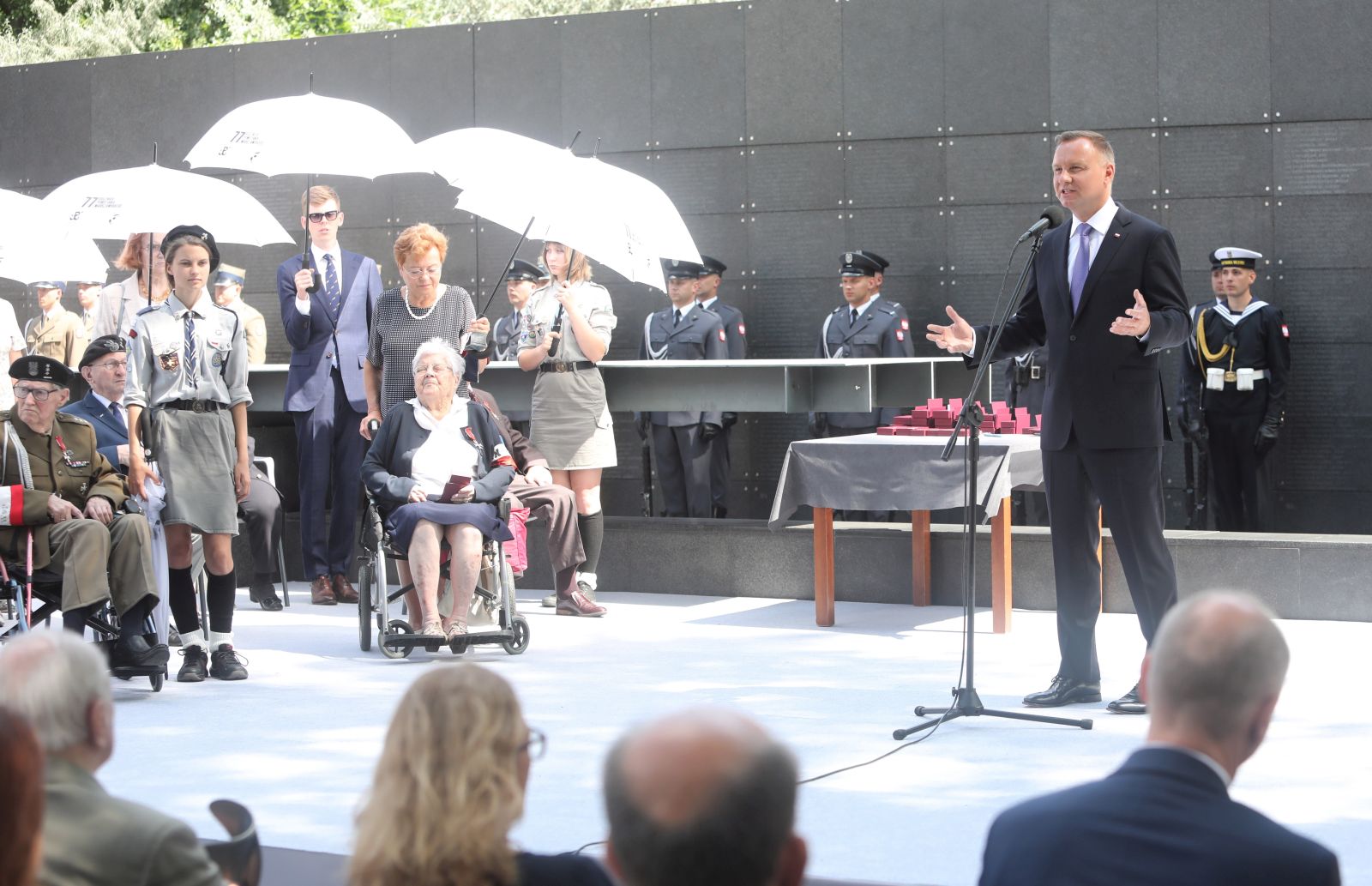 epa09379575 Polish President Andrzej Duda (R) speaks during the commemoration of the 77th anniversary of Warsaw Uprising of 1944 at the Warsaw Uprising Museum, in Warsaw, Poland, 30 July 2021. The Warsaw Uprising was an armed insurrection during the Second World War organized by the Polish underground resistance, led by Home Army (AK), against the Nazi occupation of Poland.  EPA/Wojciech Olkusnik POLAND OUT