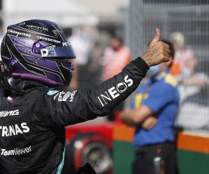 epa09383010 British Formula One driver Lewis Hamilton of Mercedes-AMG Petronas reacts at parc ferme after taking the pole position in the qualifying session of Formula One Grand Prix of Hungary at the Hungaroring circuit in Mogyorod, near Budapest, Hungary, 31 July 2021. The Formula One Grand Prix of Hungary will take place on 01 August 2021.  EPA/DAVID W CERNY / POOL
