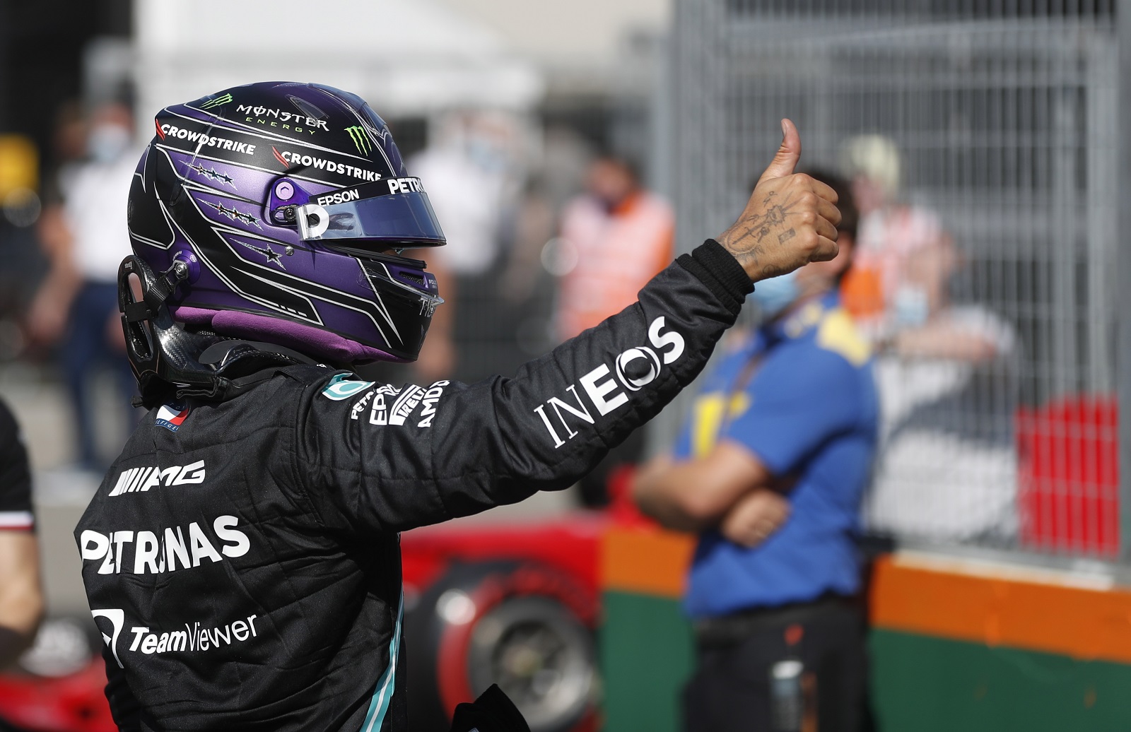 epa09383010 British Formula One driver Lewis Hamilton of Mercedes-AMG Petronas reacts at parc ferme after taking the pole position in the qualifying session of Formula One Grand Prix of Hungary at the Hungaroring circuit in Mogyorod, near Budapest, Hungary, 31 July 2021. The Formula One Grand Prix of Hungary will take place on 01 August 2021.  EPA/DAVID W CERNY / POOL