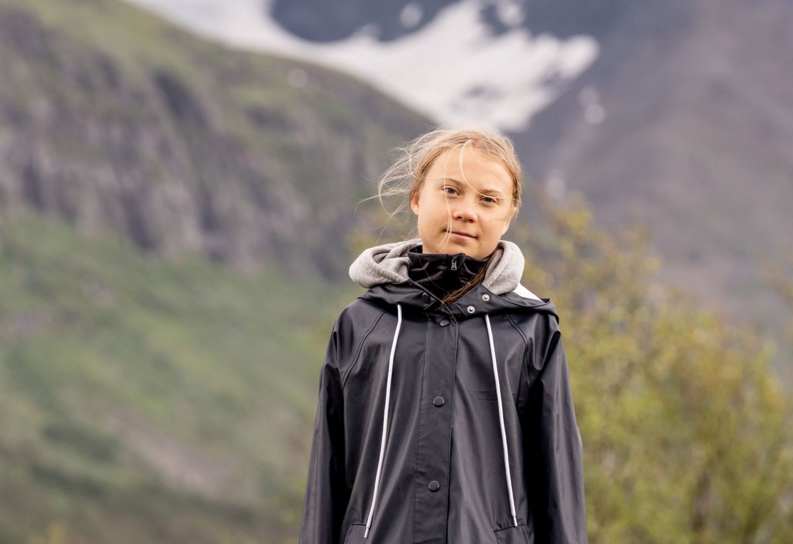 epa09342983 Climate activist Greta Thunberg poses for a photo by the Ahkka mountain at the world heritage site of the Laponia area in Sapmi, Sweden, 13 July 2021.  EPA/CARL-JOHAN UTSI  SWEDEN OUT