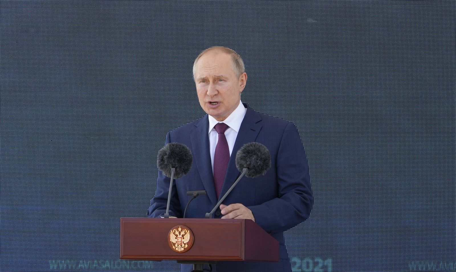 epa09354859 Russian President Vladimir Putin speaks at the opening of the MAKS-2021 International Aviation and Space Salon in Zhukovsky outside Moscow, Russia, 20 July 2021. Russia on 20 July unveiled a prototype of its prospective new fighter jet at the Moscow air show. MAKS 2021 International Aviation and Space Salon takes place from 20 to 25 July.  EPA/ALEXANDER ZEMLIANICHENKO/POOL