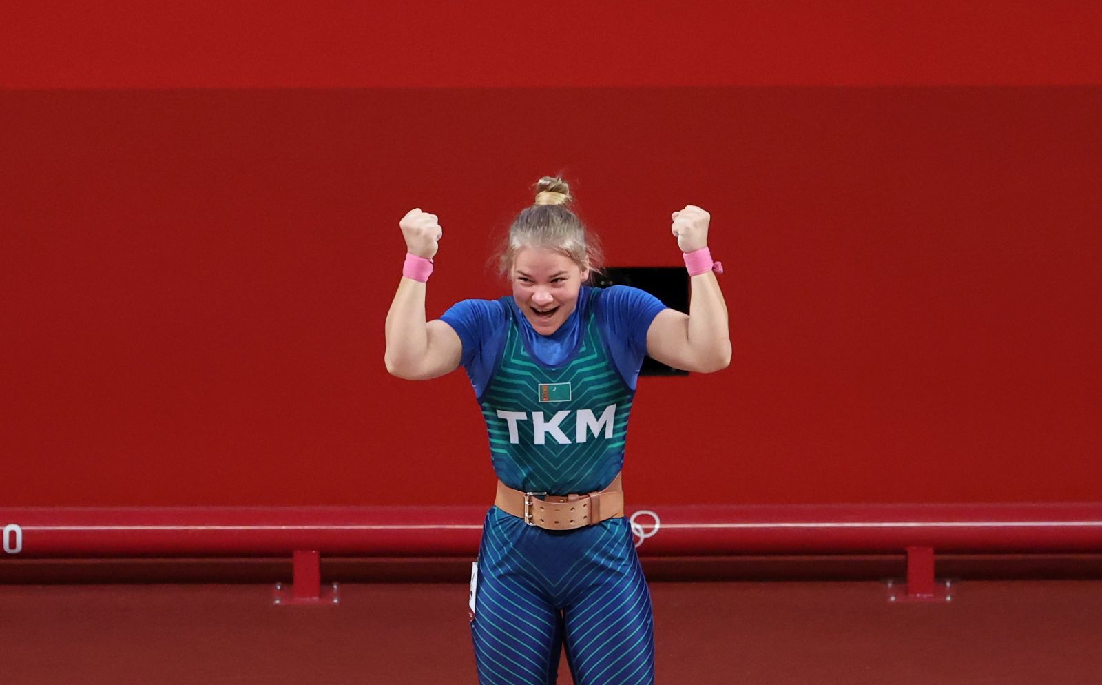 epa09369439 Polina Guryeva of Turkmenistan reacts competing in the Women's 59kg Group A competition during the Weightlifting events of the Tokyo 2020 Olympic Games at the Tokyo International Forum in Tokyo, Japan, 27 July 2021.  EPA/FAZRY ISMAIL