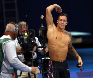 epa09383503 Caeleb Dressel of the US reacts after winning the gold medal in the Men's 50m Freestyle Final during the Swimming events of the Tokyo 2020 Olympic Games at the Tokyo Aquatics Centre in Tokyo, Japan, 01 August 2021.  EPA/HOW EWEE YOUNG