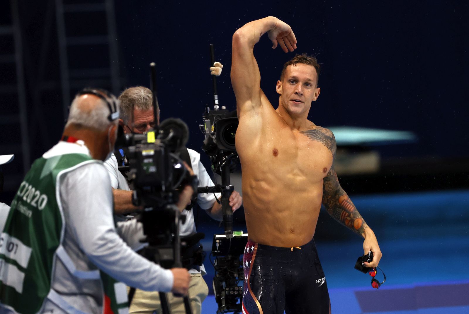 epa09383503 Caeleb Dressel of the US reacts after winning the gold medal in the Men's 50m Freestyle Final during the Swimming events of the Tokyo 2020 Olympic Games at the Tokyo Aquatics Centre in Tokyo, Japan, 01 August 2021.  EPA/HOW EWEE YOUNG