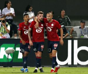 epa09386297 Xeka (C) of Lille celebrates with teammates after scoring the 1-0 lead during the French Supercup Trophee des Champions soccer match between Lille OSC and Paris Saint-Germain (PSG) at the Bloomfield Stadium in Tel Aviv, Israel, 01 August 2021.  EPA/Atef Safadi
