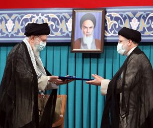 epa09389894 A handout picture made available by Iran's Supreme Leader Office shows Iranian supreme leader Ayatollah Ali khamenei (L) handing over the presidential precept to new Iranian president Ebrahim Raisi (R), in Tehran, Iran, 03 August 2021. Iranian presidents are first approved by the supreme leader, who according to constitution is the actual head of state, and then take the oath before parliament. Ebrahim Raisi has been inaugurated as the new president of the Islamic Republic of Iran on 03 August 2021, as the country is facing an economic crisis along with the coronavirus disease (COVID-19) pandemic.  EPA/IRAN'S SUPREME LEADER OFFICE HANDOUT  HANDOUT EDITORIAL USE ONLY/NO SALES