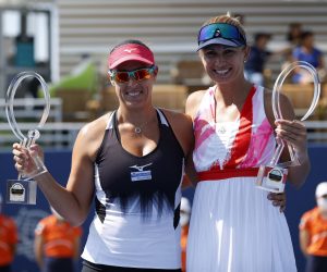 epa09406807 Darija Jurak of Croatia (R) and Andreja Klepac of Slovenia (L) pose with their trophies after defeating Gabriela Dabrowski of Canada and Luisa Stefani of Brazil at the conclusion of their doubles finals match of the women's Mubadala Silicon Valley Classic tennis tournament at San Jose State University in San Jose, California, USA, 08 August 2021.  EPA/JOHN G. MABANGLO