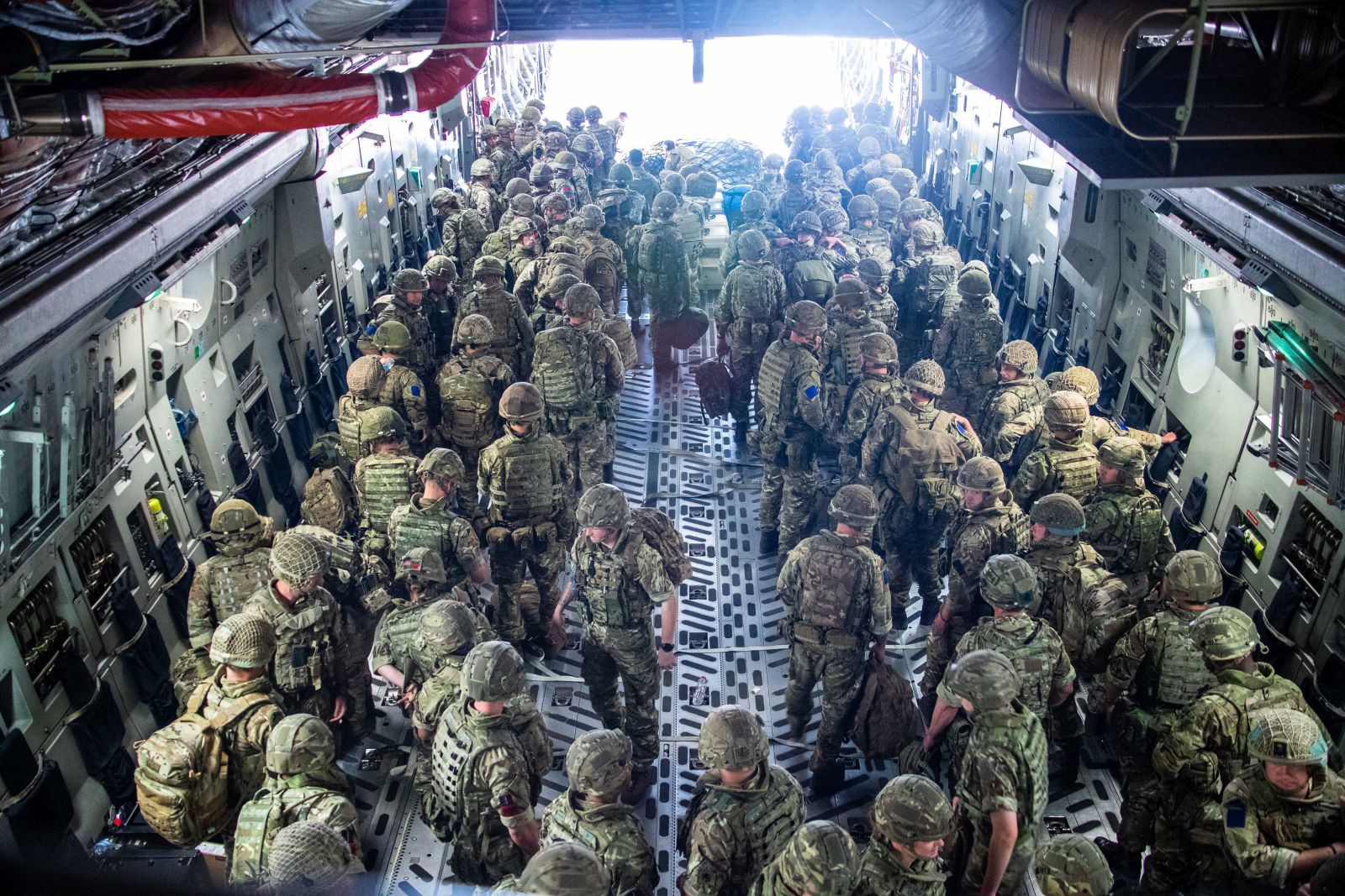 epa09415674 A handout picture provided by the British Ministry of Defence shows British Forces from 16 Air Assault Brigade on arrival in Kabul, Afghanistan, 15 August 2021. The military personnel are deployed to assist in evacuating British nationals and entitled persons as part of Operation PITTING amidst the worsening security situation there. The additional deployment of approximately 600 troops is to facilitate the safe and deliberate exit of remaining UK and eligible personnel.  EPA/Leading Hand BEN SHREAD / BRITISH MINISTRY OF DEFENCE / HANDOUT MANDATORY CREDIT: MOD/CROWN COPYRIGHT HANDOUT EDITORIAL USE ONLY/NO SALES