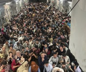 epa09417900 A picture made available on 17 August 2021 shows approximately 640 Afghan citizens being evacuated on an United States Air Force C-17 Globemaster III airplane from Hamid Karzai International Airport 15 August 2021 in Kabul, Afghanistan. The United States military has been working to evacuate US citizens and some Afghan citizens after the Taliban took over Afghanistan as the US pulled out of the country.  EPA/AIR MOBILITY COMMAND PUBLIC AFFAIRS HANDOUT  HANDOUT EDITORIAL USE ONLY/NO SALES
