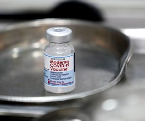 epa09429829 (FILE) - A vial of Moderna COVID-19 vaccine sits on a tray, in Hanoi, Vietnam, 27 July 2021 (reissued 26 August 2021). Japan's health ministry suspended the usage of around 1.6 million doses of Moderna COVID-19 vaccine after the discovery of foreign material in a production line.  EPA/LUONG THAI LINH