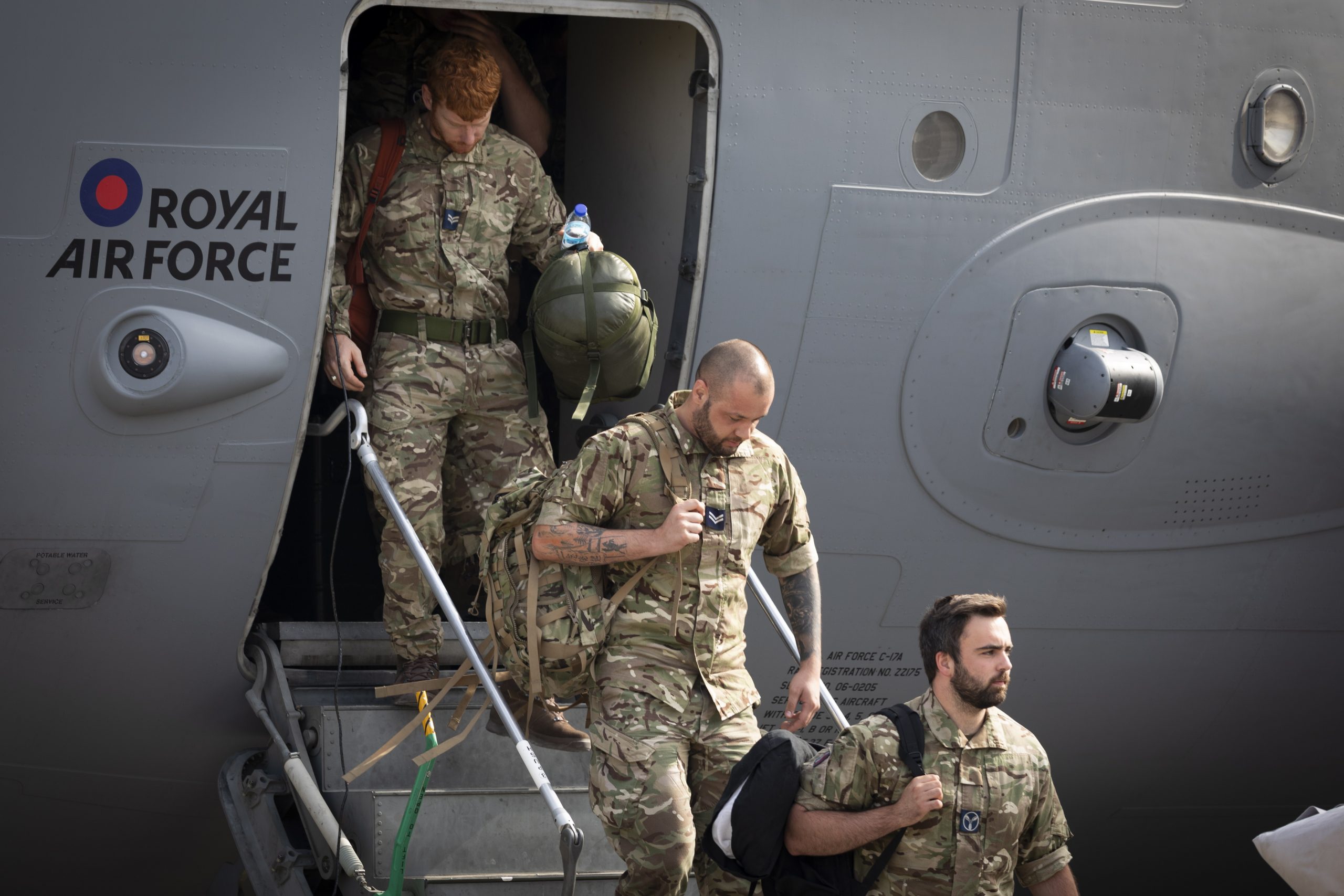epa09435167 A handout picture provided by the British Royal Air Force shows British military personnel returning to RAF Brize Norton, 29 August 2021. According to the UK's Ministry of Defence, a military aircraft carrying military and MOD personnel and freight returned from Kabul on one of the final flights out of Afghanistan, as the UK’s military involvement in evacuations from Kabul ended.  EPA/Matthews RAF/BRITISH MINISTRY OF DEFENCE HANDOUT MANDATORY CREDIT: MOD/CROWN COPYRIGHT HANDOUT EDITORIAL USE ONLY/NO SALES
