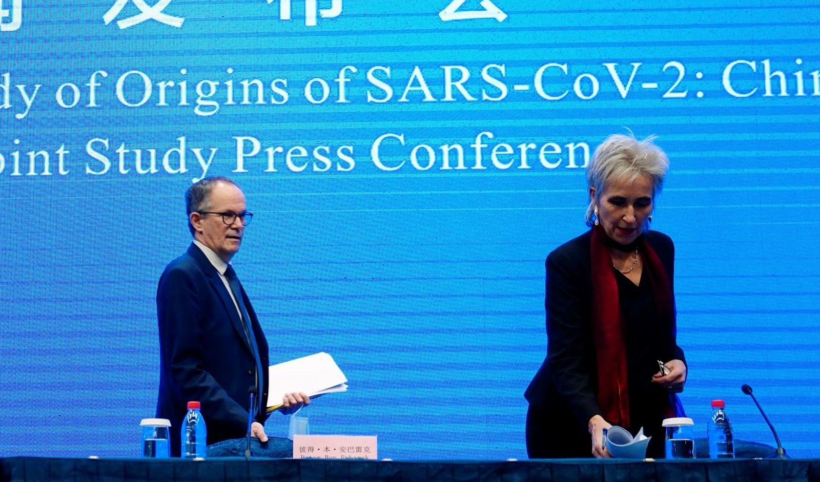 FILE PHOTO: WHO team at a news conference in Wuhan FILE PHOTO: Peter Ben Embarek and Marion Koopmans, members of the World Health Organization (WHO) team tasked with investigating the origins of the coronavirus disease (COVID-19), arrive for the WHO-China joint study news conference at a hotel in Wuhan, Hubei province, China February 9, 2021. REUTERS/Aly Song/File Photo Aly Song