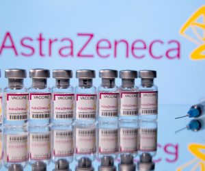 FILE PHOTO: Vials labelled 'Astra Zeneca COVID-19 Coronavirus Vaccine' and a syringe are seen in front of a displayed AstraZeneca logo in this illustration photo FILE PHOTO: Vials labelled "Astra Zeneca COVID-19 Coronavirus Vaccine" and a syringe are seen in front of a displayed AstraZeneca logo, in this illustration photo taken March 14, 2021. REUTERS/Dado Ruvic/Illustration/File Photo Dado Ruvic