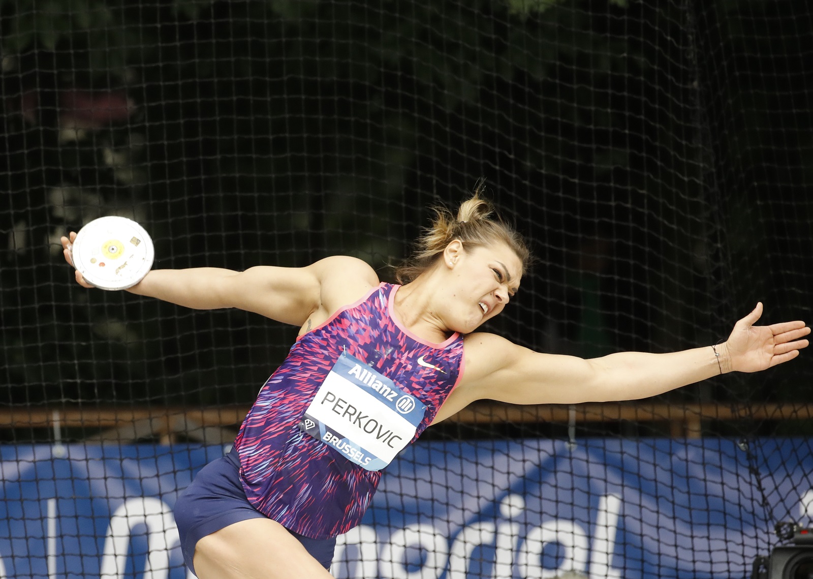 epa09440795 Sandra Perkovic of Croatia in action during the Women's Discus throw competition at the IAAF Diamond League Memorial Van Damme athletics meeting at La Camber Park in Brussels, Belgium, 01 September 2021.  EPA/OLIVIER HOSLET