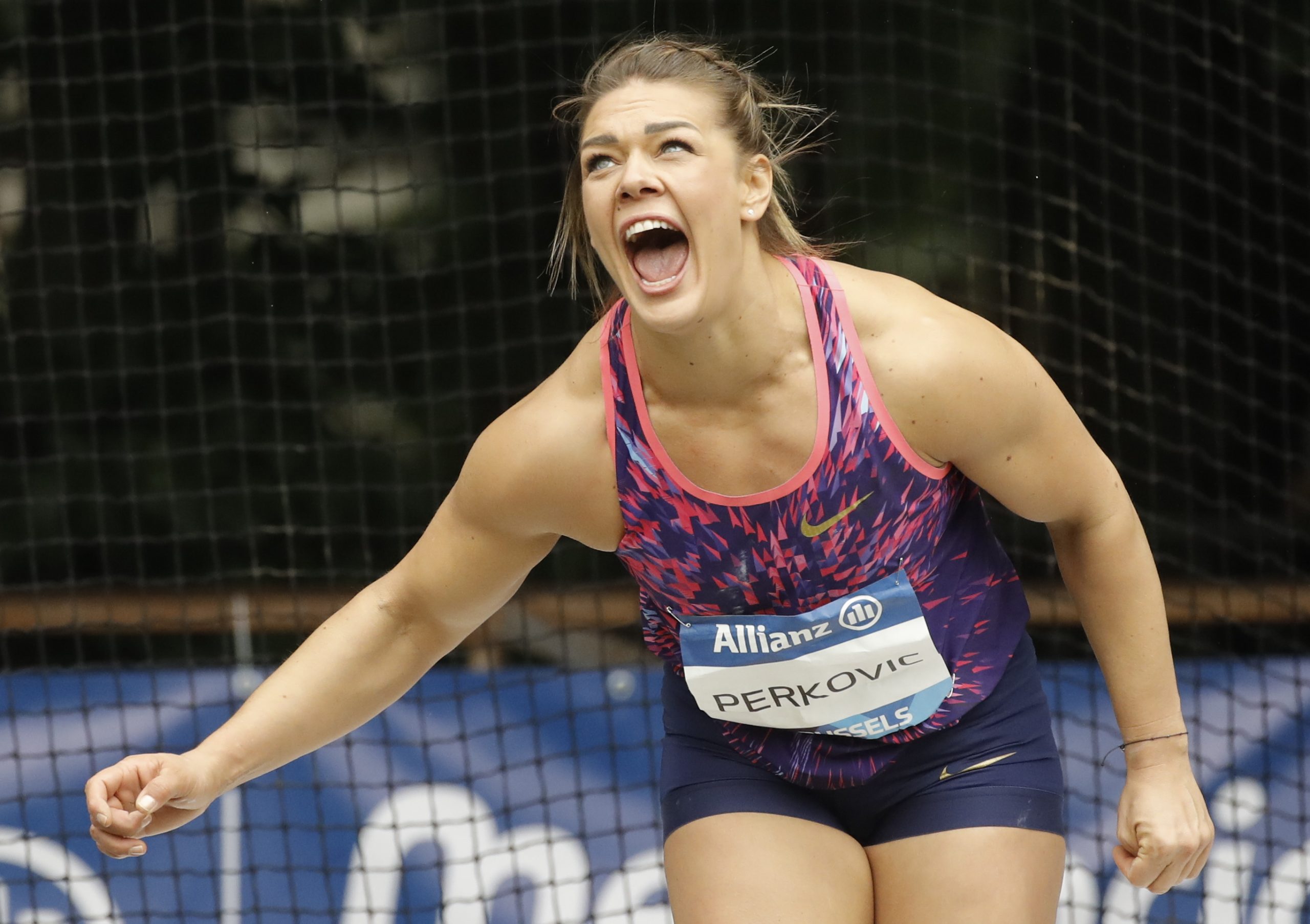 epa09440791 Sandra Perkovic of Croatia in action during the Women's Discus throw competition at the IAAF Diamond League Memorial Van Damme athletics meeting at La Camber Park in Brussels, Belgium, 01 September 2021.  EPA/OLIVIER HOSLET