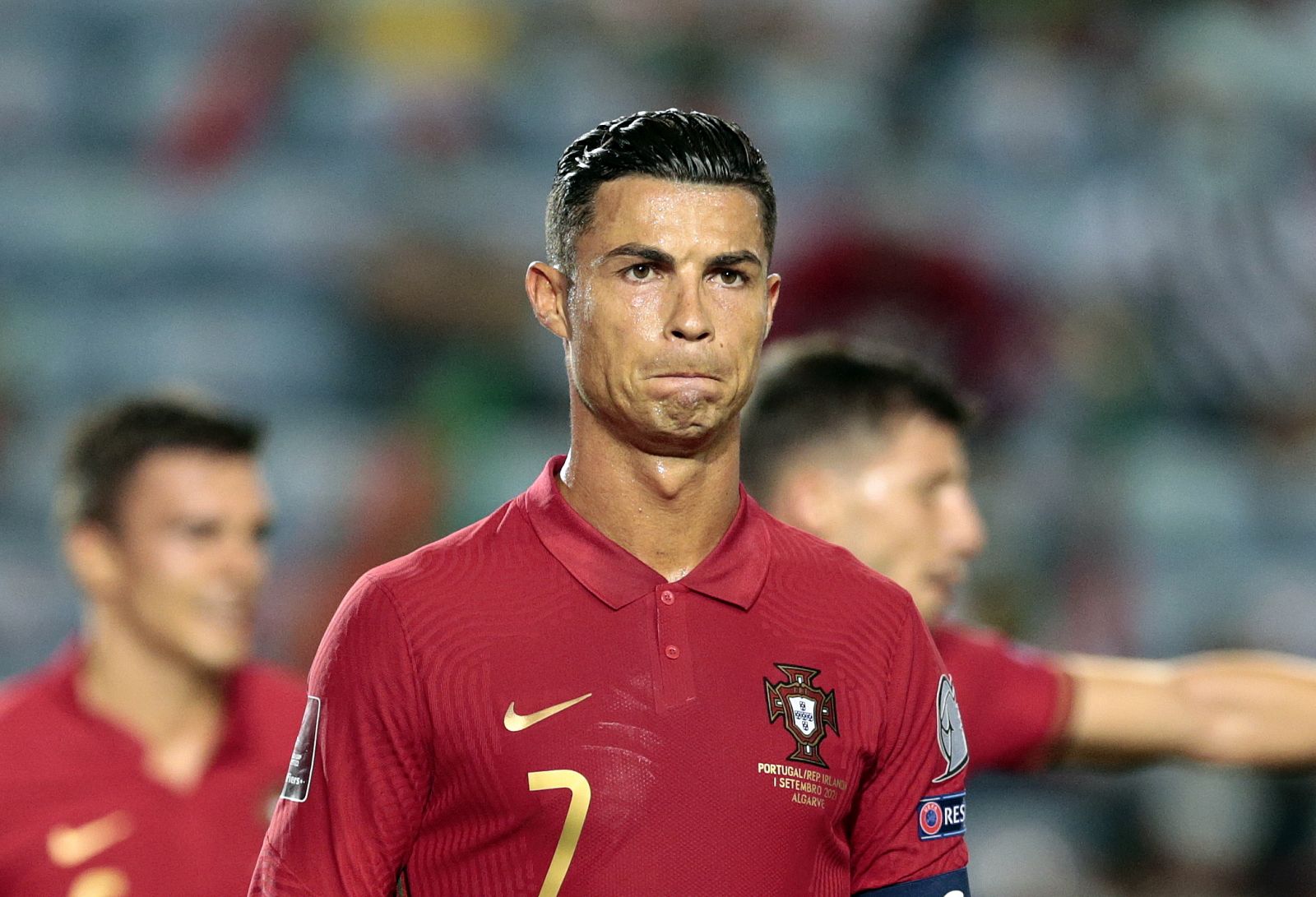 epa09441619 Portugal´s Cristiano Ronaldo reacts  during the FIFA World Cup  Qatar 2022 group A qualification soccer match between Portugal and Ireland held at Algarve stadium in Faro, Portugal, 01 September  2021.  EPA/ANTONIO COTRIM