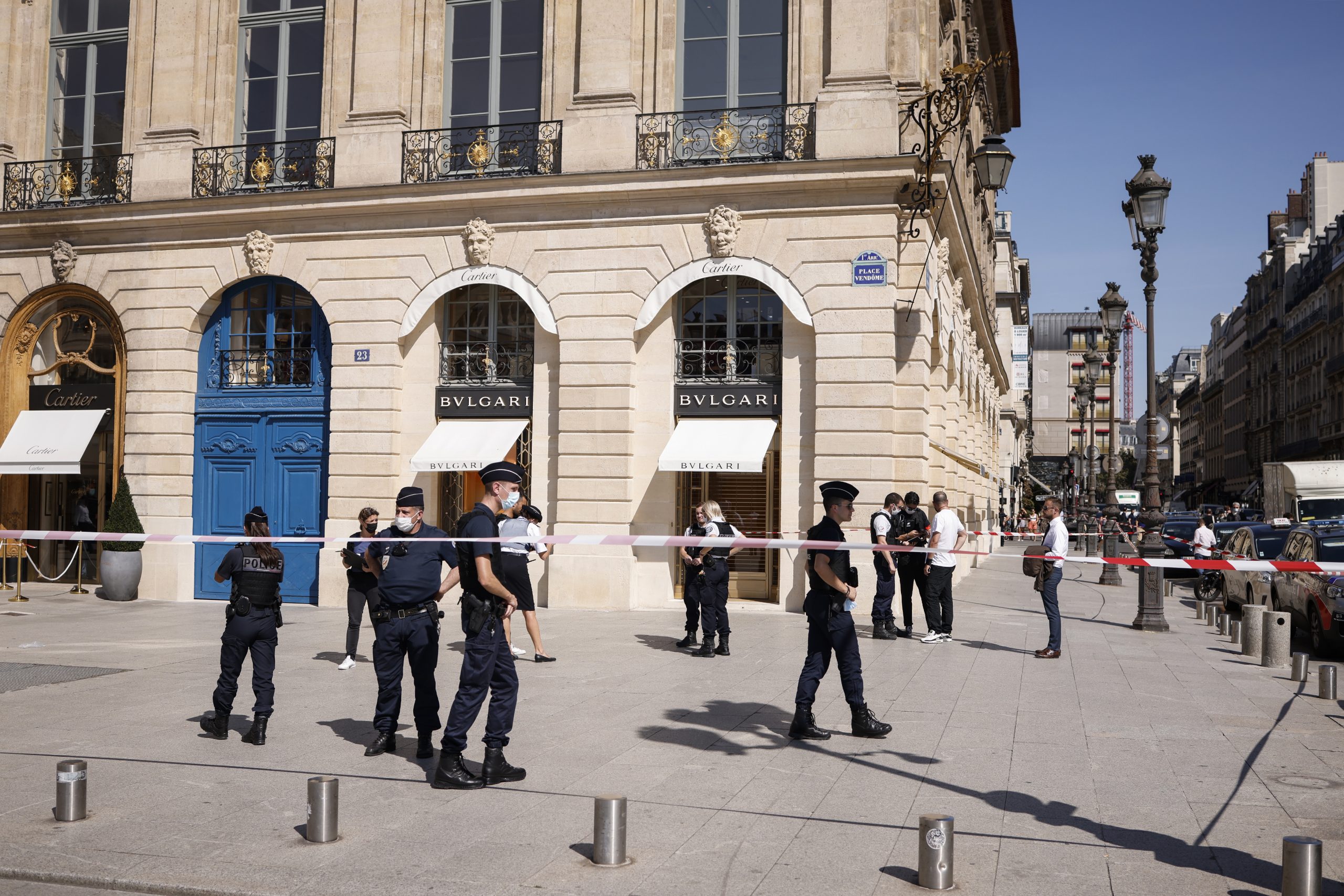 epa09453214 Policemen patrol in front of a Bulgari luxury Jewelry shop after a robbery at Place Vendome in Paris, France, 07 September 2021. According to police, two alleged perpetrators were arrested.  EPA/YOAN VALAT