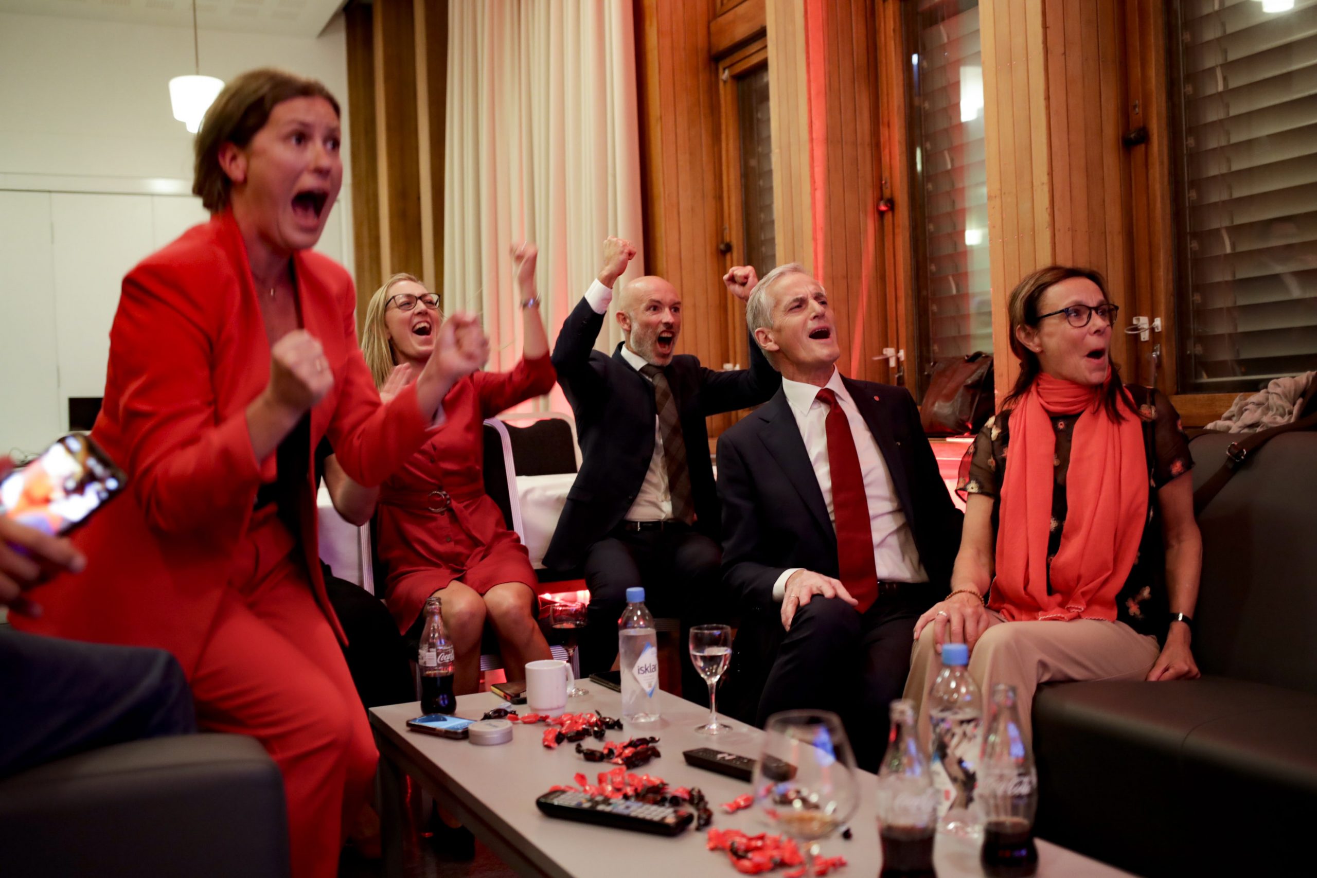 epa09466305 Norway's Labor leader Jonas Gahr Store cheers after seing the exit poll at the Labor Party's election vigil in Oslo, Norway, 13 September 2021, during the 2021 parliamentary elections.  EPA/Javad Parsa  NORWAY OUT