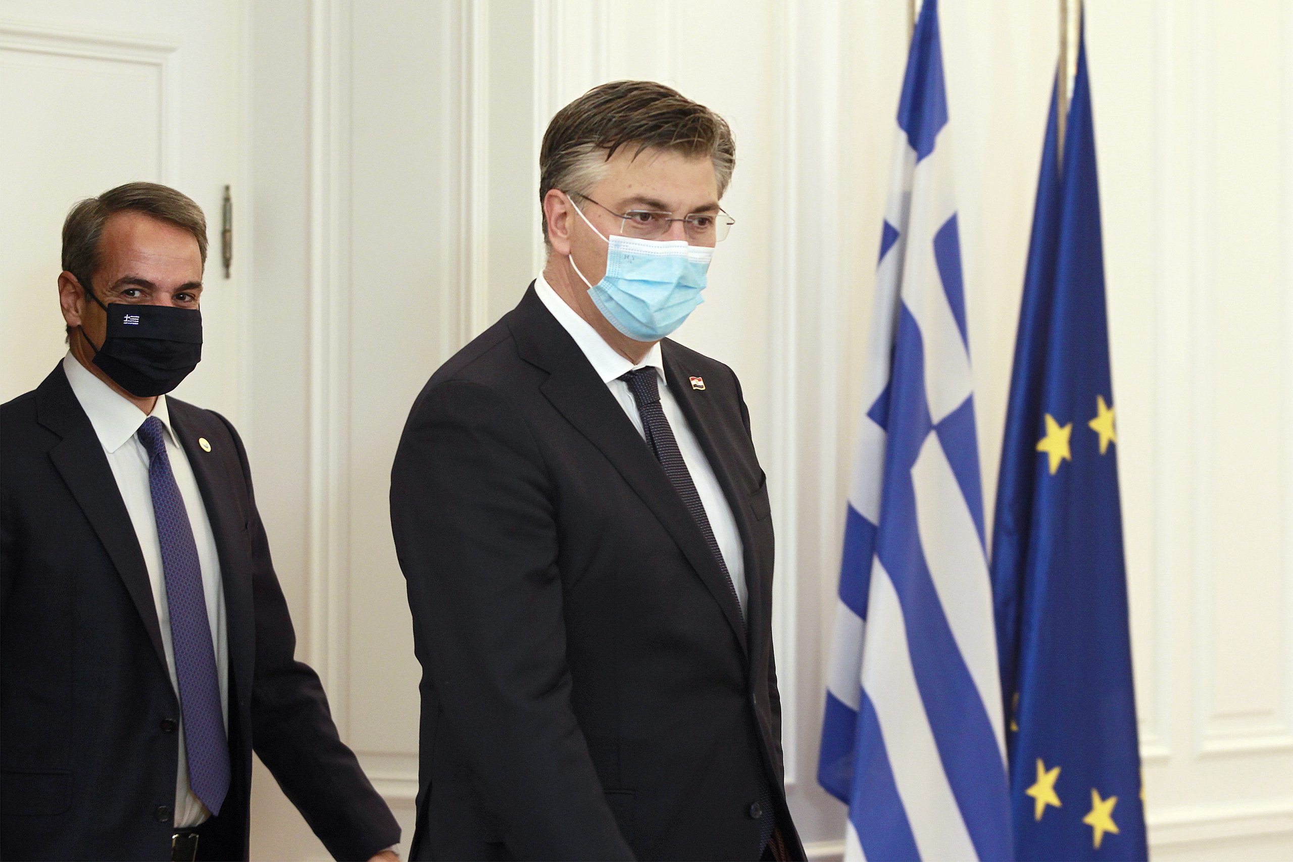epa09472951 Greek Prime Minister Kyriakos Mitsotakis (L) talks with the Prime Minister of Croatia Andrej Plenkovic (R) during their meeting at the Maximou Mansion in Athens, Greece, 17 September 2021. Croatian Prime Minister Andrej Plenkovic will participate at the EUMed 9 Summit, TO be held on Friday in Athens, at the Stavros Niarchos Foundation Culture Centre (SNFCC).  EPA/ALEXANDROS VLACHOS