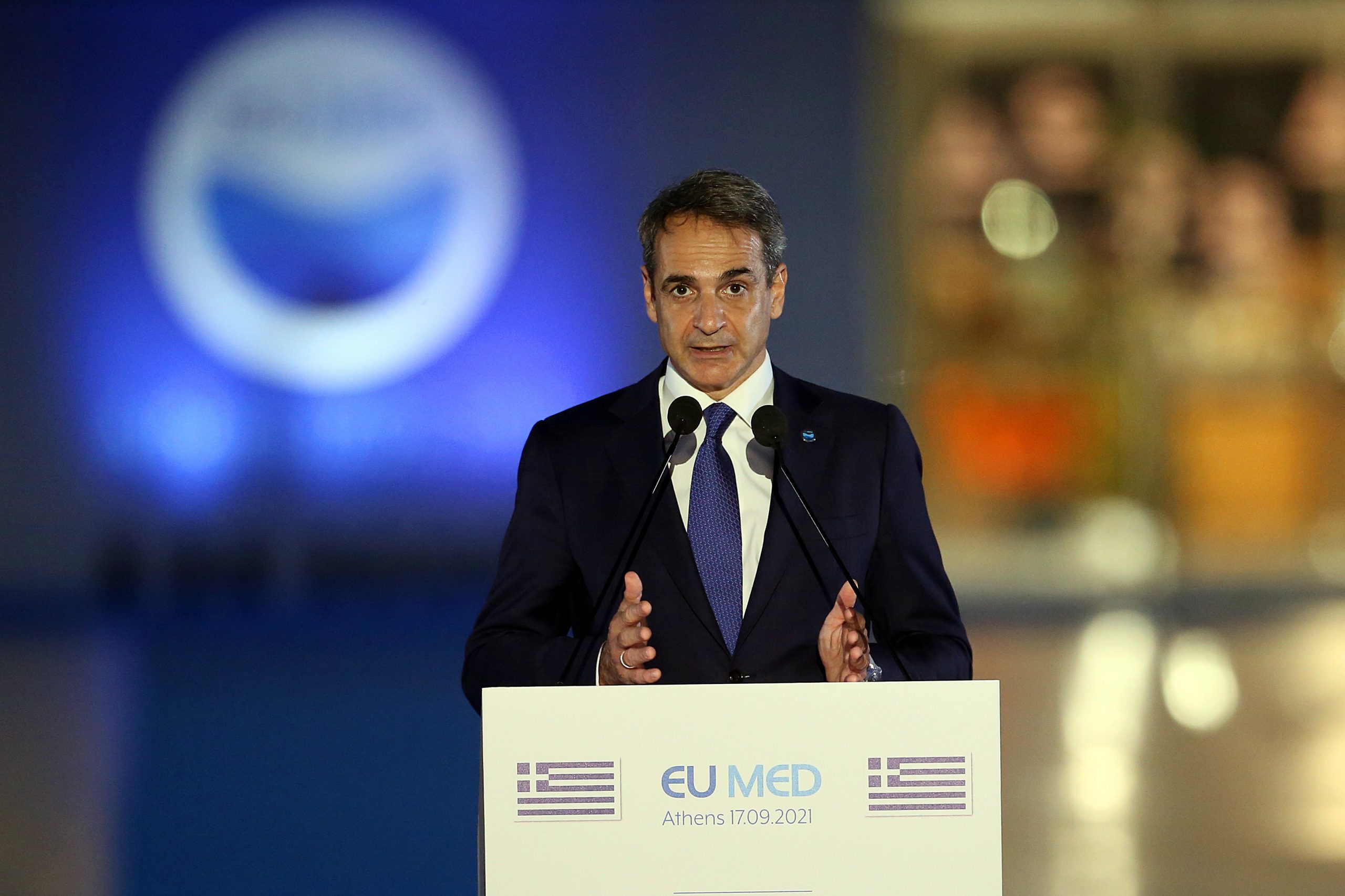 epa09473985 Prime Minister of Greece Kyriakos Mitsotakis makes statements during the EUMed9 Summit, in Athens, Greece, 17 September 2021.The agenda of the Summit, which acquires special geopolitical weight, includes security challenges in the Mediterranean that endanger stability in the region, potential new crises, such as the threat of migration flows after the latest developments in Afghanistan, and other crises, the consequences of which Mediterranean countries are already experiencing.  EPA/ORESTIS PANAGIOTOU