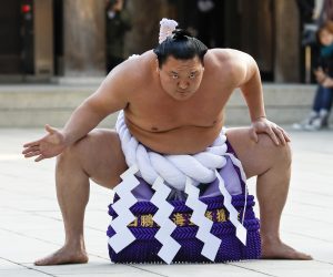 epa09490704 (FILE) - Yokozuna or grand champion sumo wrestler Hakuho Sho, born on 11 March 1985 as Monkhbatyn Davaajargal in Ulaanbataar, Mongolia, performs a ring-purification ritual at Meiji-Jingu Shrine in Tokyo, Japan, 09 January 2018 (reissued 27 September 2021). According to Jiji Press on 27 September 2021, Yokozuna Hakuho has decided to retire following a right knee injury. Hakuho won 45 tournaments during his career, an all time record in the sport.  EPA/KIMIMASA MAYAMA