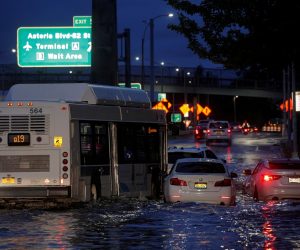 A bus navigates past abandoned cars on a flooded highway in Queens, New York A bus navigates past abandoned cars on a flooded highway, as local media reported the remnants of Tropical Storm Ida bringing drenching rain and the threat of flash floods and tornadoes to parts of the northern mid-Atlantic, in the Queens borough of New York City, U.S., September 2, 2021.  REUTERS/Brendan McDermid BRENDAN MCDERMID