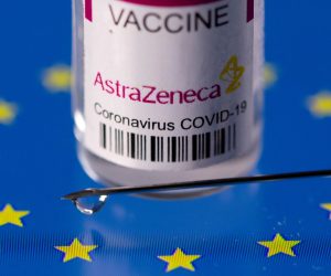FILE PHOTO: Vial labelled "AstraZeneca coronavirus disease (COVID-19) vaccine" placed on displayed EU flag is seen in this illustration picture FILE PHOTO: Vial labelled "AstraZeneca coronavirus disease (COVID-19) vaccine" placed on displayed EU flag is seen in this illustration picture taken March 24, 2021. REUTERS/Dado Ruvic/Illustration/File Photo Dado Ruvic