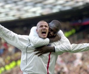 FILE - This is a Saturday, Oct. 6, 2001 file photo of England's captain David Beckham, left, as he  is congratulated by teammate Emile Heskey after scoring their second goal against Greece during their 2002 World Cup qualifying match at Old Trafford Manchester England.  England soccer team coach Fabio Capello said Wednesday Aug. 11, 2010  that  Davis Beckham the 35-year-old former captain, who has made 115 appearances for his country and played in three World Cups, is too old and will no longer be a part of his plans as he prepares for the 2012 European Championship qualifying campaign.  (AP Photo/Adam Butler, File)