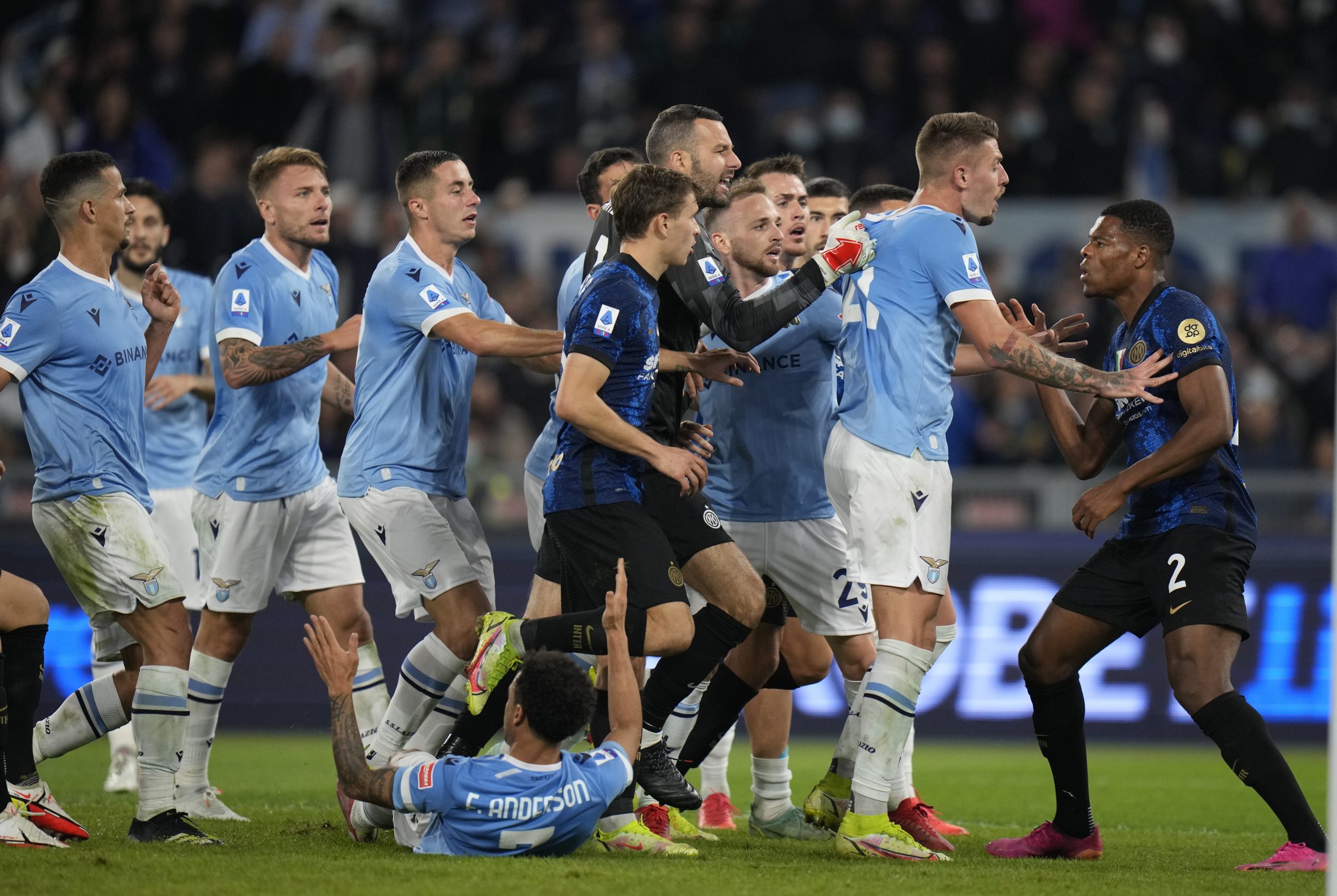 Inter Milan's Denzel Dumfries, right, and Lazio players argue during a Serie A soccer match between Lazio and Inter Milan at Rome's Olympic stadium, Saturday, Oct. 16, 2021. (AP Photo/Alessandra Tarantino)