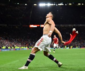 epa09496464 Cristiano Ronaldo of Manchester United celebrates after scoring the winning goal during the UEFA Champions League group F soccer match between Manchester United and Villarreal CF in Manchester, Britain, 29 September 2021.  EPA/Peter Powell
