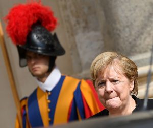 epa09510682 German Chancellor Angela Merkel leaves after a private audience with Pope Francis, at the San Damaso courtyard in Vatican City, 07 October 2021.  EPA/ETTORE FERRARI
