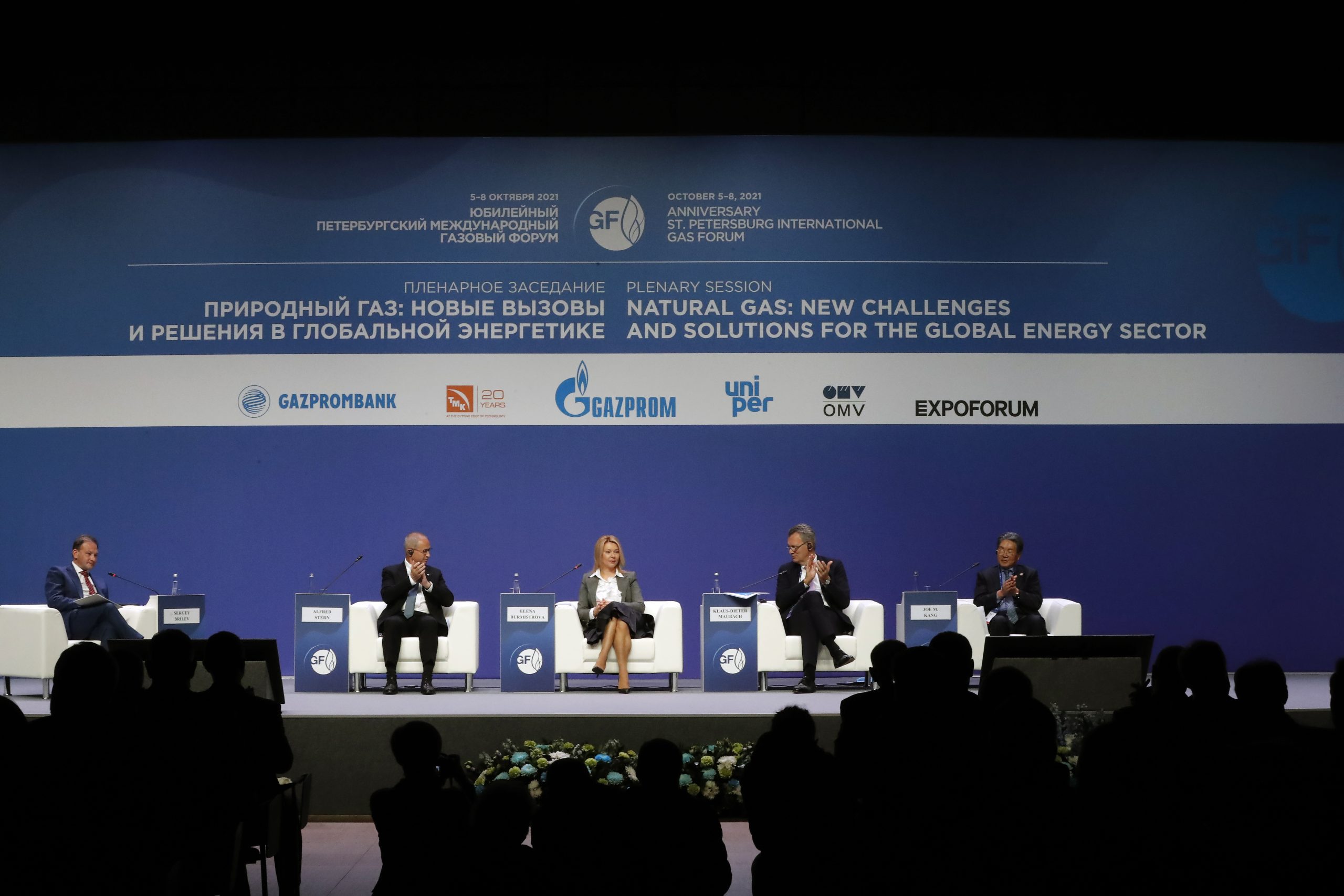 epa09511011 (2-L to R) Alfred Stern, Chairman of the Executive Board, CEO, OMV AG, Elena Burmistrova, Director General of Gazprom Export, Prof. Dr. Klaus-Dieter Maubach, Chief Executive Officer of Uniper SE and Mr. Joe M. Kang, President of International Gas Union attend a plenary session titled ‘Natural Gas: New Challenges and Solution For The Global Energy Sector'  during the 10th St. Petersburg International Gas Forum, in St. Petersburg, Russia, 07 October 2021. The forum lasts from 05 to 08 October 2021.  EPA/ANATOLY MALTSEV