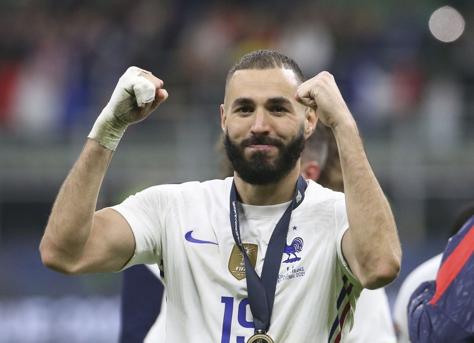 epa09517620 France's Karim Benzema celebrates after the UEFA Nations League final soccer match between Spain and France in Milan, Italy, 10 October 2021.  EPA/MATTEO BAZZI